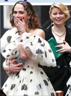  ?? ?? GOING DOTTY: Jessica Brown Findlay has a laugh on set last week. Left: As Downton’s Lady Sybil