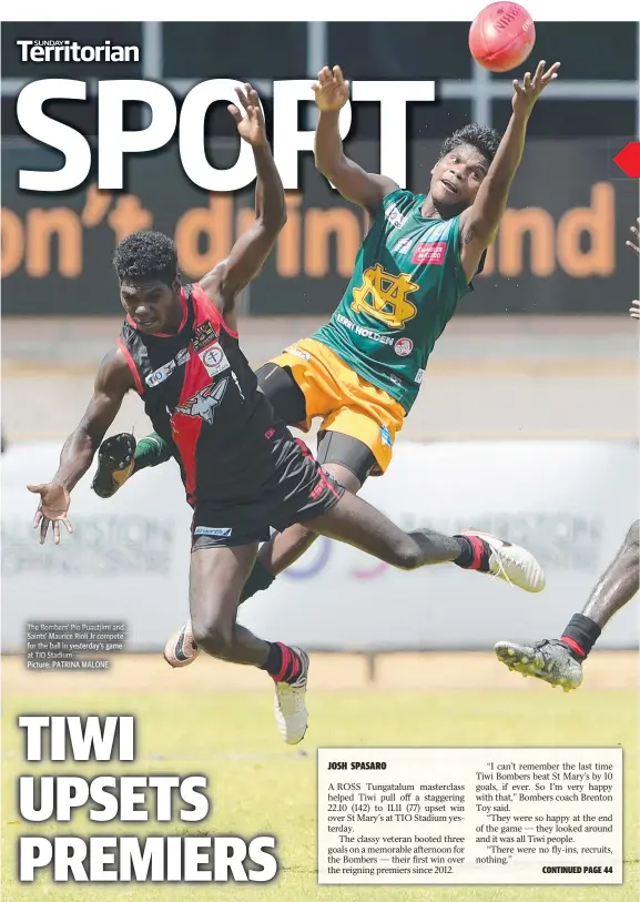  ?? Picture: PATRINA MALONE ?? The Bombers’ Bombers Pio Puautjimi and Saints’ Saints Maurice Rioli Jr compete for the ball in yesterday’s yester yesterday s gamegame at TIO Stadium