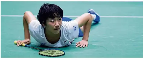  ??  ?? Stunner: South Korea’s An Se-young falls after hitting a return against Taiwan’s Tai Tzuying during their women’s singles match at the Sudirman Cup yesterday. — AFP