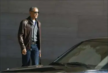  ?? JOSE LUIS MAGANA — THE ASSOCIATED PRESS FILE ?? Former President Barack Obama leaves the National Gallery of Art in Washington. The AP reported on that a story circulatin­g online claiming President Donald Trump has cut off more than $2 billion earmarked for funding of Obama’s vacations through 2036...