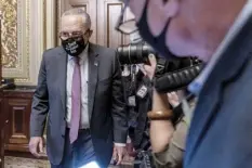  ?? AP photo ?? Senate Majority Leader Sen. Chuck Schumer of N.Y., leaves a Senate Democratic meeting at the Capitol in Washington on Wednesday as a showdown looms with Republican­s over raising the debt limit.