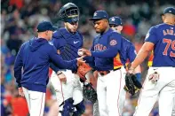  ?? ERIC CHRISTIAN SMITH/ASSOCIATED PRESS FILE PHOTO ?? Houston Astros starting pitcher Framber Valdez, center, hands the ball to manager Joe Espada while being removed during an April 2 game against the Blue Jays in Houston.