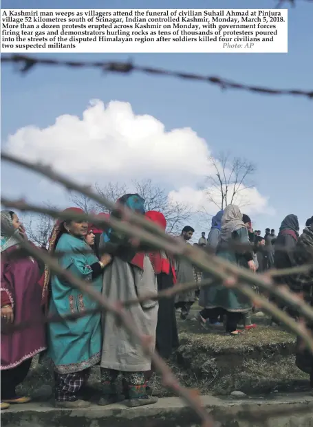  ?? Photo: AP ?? A Kashmiri man weeps as villagers attend the funeral of civilian Suhail Ahmad at Pinjura village 52 kilometres south of Srinagar, Indian controlled Kashmir, Monday, March 5, 2018. More than a dozen protests erupted across Kashmir on Monday, with...