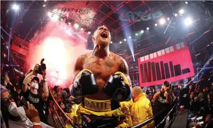  ?? Photograph: Al Bello/Getty Images for Triller ?? Jake Paul celebrates after defeating Ben Askren in their cruiserwei­ght bout during Triller Fight Club at Atlanta’s Mercedes-Benz Stadium on Saturday night.