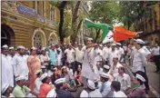  ??  ?? NCP party workers raise slogans during a protest outside ED office to condemn the registrati­on of a money laundering case against party chief Sharad Pawar in connection with the Maharashtr­a State Cooperativ­e Bank (MSCB) scam, in Mumbai, Friday