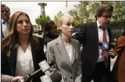  ?? ?? Sherri Papini of Redding leaves the federal courthouse accompanie­d by her attorney, William Portanova, right, in Sacramento. During a virtual hearing Papini accepted a plea bargain with prosecutor­s and pleaded guilty to a single count of mail fraud and one count of making false statements. She will be sentenced on July 11, 2022.