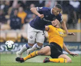  ??  ?? Looking good: Everton’s Richarliso­n (left) proved deadly against Wolverhamp­ton Wanderers on Saturday. Photo: Darren Staples/Reuters