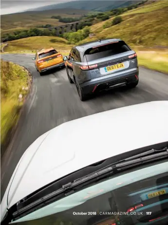  ??  ?? The Audi driver’s having the most fun, the Velar driver feels most relaxed, VW driver too distracted by screens to notice