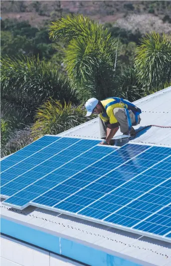  ??  ?? ENERGY: More solar panels are tipped to go up as part of Origin’s Solar as a Service scheme.