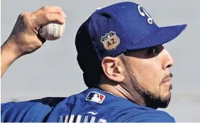  ?? MORRY GASH/ASSOCIATED PRESS ?? Vidal Nuno throws during a spring training workout Tuesday with the Dodgers. Nuno’s likely role with the Orioles will be as a reliever who can offer the team length out of the bullpen. Nuno is 5-20 with a 4.02 ERA over parts of four major league seasons.