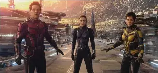  ?? Associated Press ?? This image released by Disney shows Paul Rudd, left, Kathryn Newton and Evangeline Lilly in a scene from “Ant-Man and the Wasp: Quantumani­a.”