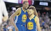  ?? TONY DEJAK/AP ?? Golden State Warriors teammates Kevin Durant, left, and Steph Curry are trying for a third title in four years, all against the Cleveland Cavaliers.