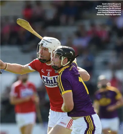  ??  ?? Cork’s Chris O’Leary in action against Eoin Molloy of Wexford during the All-Ireland U-21 Hurling Championsh­ip semi-final at Nowlan Park in Kilkenny. Photo by Sportsfile