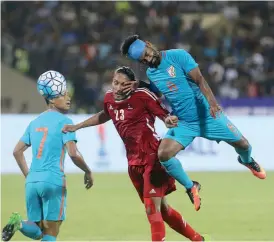  ?? — PTI ?? India’s Mohammod Rafique (right) in a tussle with Nepal’s Rohit Chand in their friendly match in Mumbai on Tuesday.