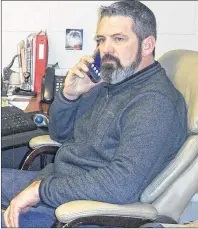  ?? SUBMITTED PHOTO ?? Here is Cory Keeping, general manager of the Emera Centre Northside, sitting at his desk and taking a call regarding an upcoming event.