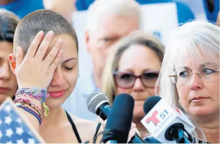  ?? RHONA WISE/GETTY IMAGES ?? “We’re trying to get people all over the state, the country, worldwide so we can stop this from continuing,” says Douglas High senior Emma Gonzalez.