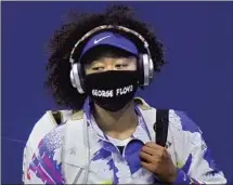  ?? Frank Franklin II Associated Press ?? ON HER WAY to winning the U.S. Open title, Naomi Osaka wore masks highlighti­ng victims of police and vigilante violence.