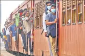  ?? REUTERS ?? Passengers ride on an overcrowde­d train as public transporta­tion gets limited fuel amid an economic crisis, in Colombo.