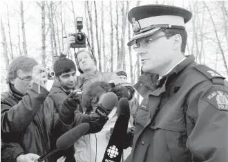  ??  ?? Then RCMP inspector Tim Shields speaks to reporters in January 2010 at the entrance to Trickle Creek Farm in Hythe, Alta., which was the home of anti-oilpatch activist and convicted bomber Weibo Ludwig, who died in 2012. Shields has been charged with...