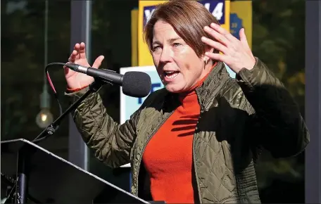  ?? STUART CAHILL — BOSTON HERALD ?? Gov. Maura Healey, then the Attorney General, speaks at a rally to promote the Work and Family Mobility Act, or Question 4, in Boston’s Nubian Square in October.