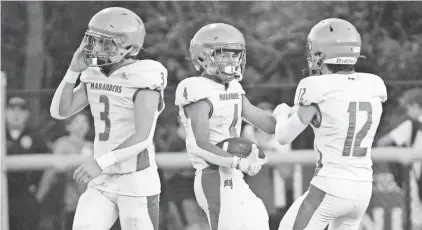  ?? TOM SALUS/SPECIAL TO DAILYRECOR­D.COM ?? Mount Olive’s Jekori Zapata (4) celebrates his touchdown with teammates Lincoln Youth (3) and Vincent Carpini against Morristown on Sept. 14 in Morristown.