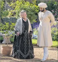  ?? AP PHOTO ?? In this image released by Focus Features, Judi Dench, left, and Ali Fazal appear in a scene from “Victoria and Abdul.”