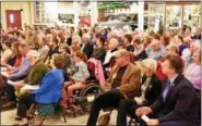  ?? JESI YOST — FOR DIGITAL FIRST MEDIA ?? More than 120 people gathered at the Boyertown Museum of Historic Vehicles to honor Boyertown’s Citizen Of The Year, Dennis Hafer