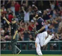  ?? DAVID DERMER — ASSOCIATED PRESS ?? Mike Napoli rounds the bases after hitting a three‑run home run off Angels reliever Brett Oberholtze­r during the fifth inning Aug. 11. Napoli leads the Central Division‑leading Indians with 29 home runs and 89 RBI.