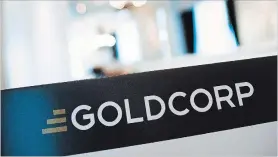  ?? AARON VINCENT ELKAIM THE CANADIAN PRESS ?? Newmont Mining Corp. will merge with rival Goldcorp Inc. accelerati­ng consolidat­ion in the global gold mining industry.