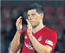  ??  ?? Defender Scott McKenna is with the Scotland squad.