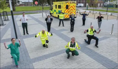  ?? Photo by Brian Lougheed. ?? Staff from the HSE, An Gárda Siochana and Cork County Council standing together but still apart and asking the people of Cork to keep up their Trojan efforts in the county’s battle to keep Covid-19 at bay.