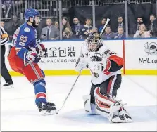  ?? THE ASSOCIATED PRESS] [FRANK FRANKLIN II/ ?? The Rangers’ Mika Zibanejad scores against Senators goalie Craig Anderson during the second period.