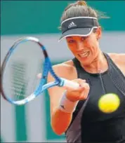  ?? AP PHOTO ?? Spain's Garbine Muguruza, the third seed, hardly broke sweat as her opponent Lesia Tsurenko got injured.