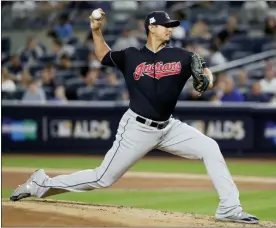  ?? FRANK FRANKLIN II — ASSOCIATED PRESS FILE ?? In an October 2017 photo, Carrasco delivers against the New York Yankees during the first inning of Game 3 of the American League Division Series in New York.