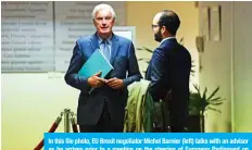  ?? — AFP ?? In this file photo, EU Brexit negotiator Michel Barnier (left) talks with an advisor as he arrives prior to a meeting on the steering of European Parliament on Brexit at the European Parliament in Brussels.