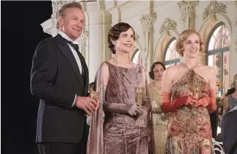  ?? BEN BLACKALL/FOCUS FEATURES ?? Elizabeth McGovern, center, stars as Cora Grantham and Laura Carmichael as Lady Edith Hexham in “Downton Abbey: A New Era.”
