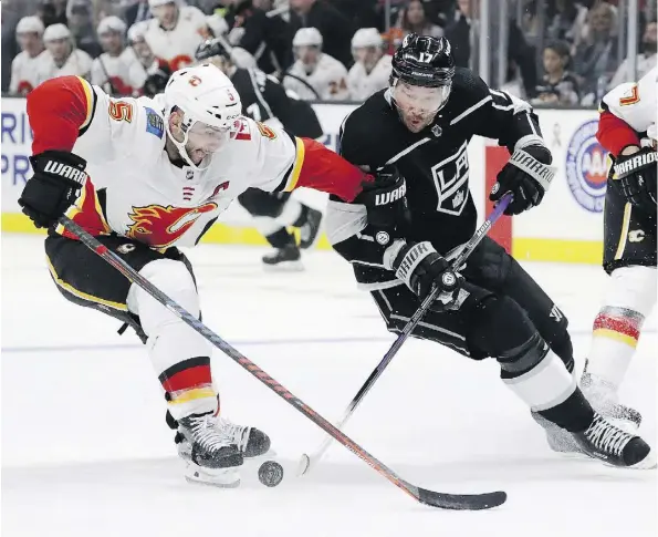  ?? CHRIS CARLSON/THE ASSOCIATED PRESS ?? Los Angeles Kings left-winger Ilya Kovalchuk, right, was in the midst of a 10-game pointless skid entering Thursday’s game against the Oilers, a slump that has seen head coach Willie Desjardins reduce his ice time.