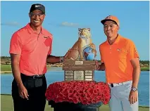  ?? MIKE EHRMANN/GETTY IMAGES ?? Tiger Woods and tournament winner Rickie Fowler after the Hero World Challenge at Albany, Bahamas.
