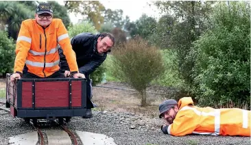  ?? JOHN BISSET/STUFF ?? From left, Ben Sewell, Ian Murie and Elliot Ball check the track at Saturday’s Bushtown Waimate’s open day.