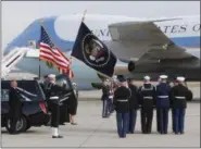  ??  ?? The flag-draped casket of former President George H.W. Bush is carried by a joint services military honor guard during a departure ceremony at Andrews Air Force Base, Md., Wednesday.