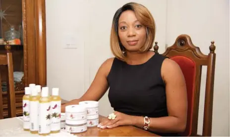  ?? JON NICHOLLS FOR THE TORONTO STAR ?? Business owner Kim Niles launched her beauty product line — Kym Nylz — for the hair and skin in March of this year.