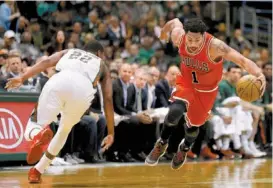  ?? FOTO: AP ?? Derrick Rose (d), clave para los Bulls de Chicago