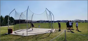  ?? David Jacobs/sdg Newspapers ?? Members of the throwers on the Shelby track team throw the discuss on March 13 as they ready for the season.