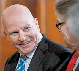  ?? ANDREW HARNIK/AP ?? Outgoing national security adviser H.R. McMaster talks with Energy Secretary Rick Perry on his last day.