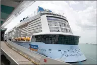  ??  ?? The Quantum of the Seas cruise ship is docked Wednesday at the Marina Bay Cruise Center in Singapore. (AP/Danial Hakim)