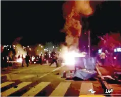  ??  ?? Protesters are seen on street in Alborz Province, Iran, in this still image taken from video. — Reuters photo