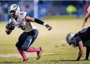  ?? [PHOTO BY SARAH PHIPPS, THE OKLAHOMAN] ?? McGuinness’s Dominic Richardson gets by Guthrie’s Tervae Williams earlier this season.