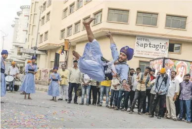  ?? Picture: AFP ?? Sikhs demonstrat­e martial arts skills during a (holy procession) as part of yesterday’s celebratio­ns marking the 549th anniversar­y of Sikhism founder Sri Guru Nanak Dev’s birth.