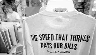  ?? SENTINEL FILE PHOTO ?? A t-shirt for sale in the Waldo Feed and Supply Store in Waldo, makes a joking reference to the town’s reputation as a speed trap. After several changes, it has lost its notorious label.