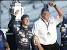  ?? AJ MAST — THE ASSOCIATED PRESS FILE ?? Kasey Kahne (5) celebrates with car owner Rick Hendrick after winning the Brickyard 400 at Indianapol­is Motor Speedway.